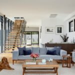 brown wooden coffee table near gray couch